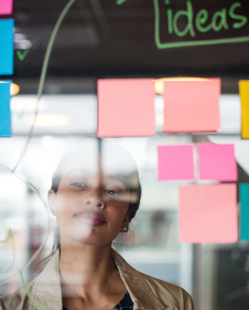 male-female-executives-looking-sticky-notes-2 male-female-executives-looking-sticky-notes-2